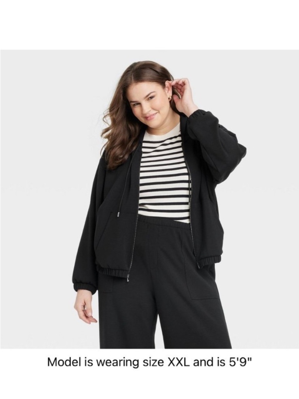 The Universal Thread Black Hooded Zip Up Sweatshirt in XL is a versatile piece